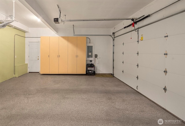 garage featuring a garage door opener and electric panel