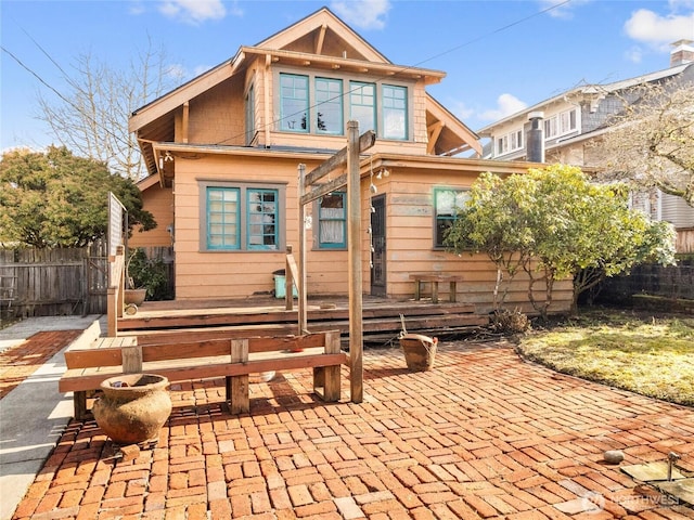 rear view of house with a patio area