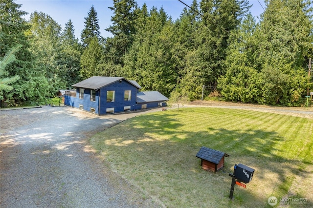 exterior space with a front yard