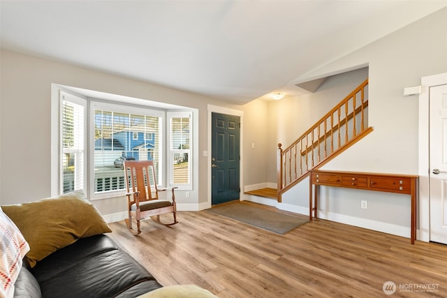 living room with light hardwood / wood-style floors