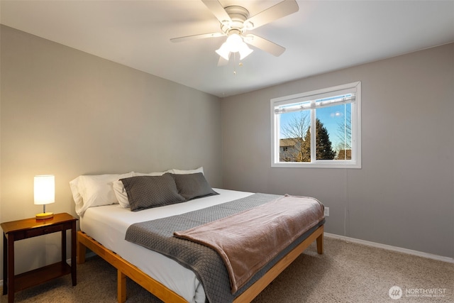 bedroom with ceiling fan and carpet floors