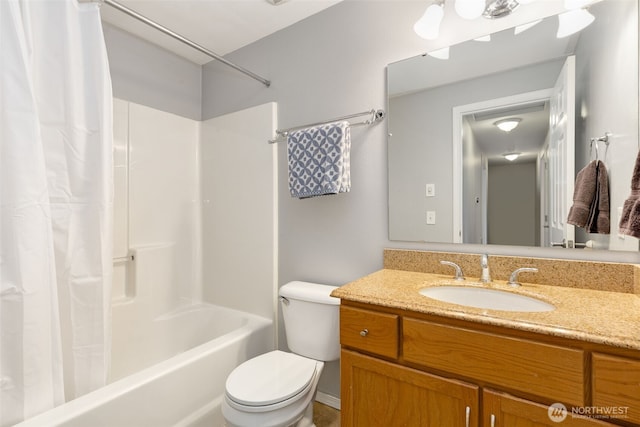 full bathroom featuring vanity, toilet, and shower / bath combo