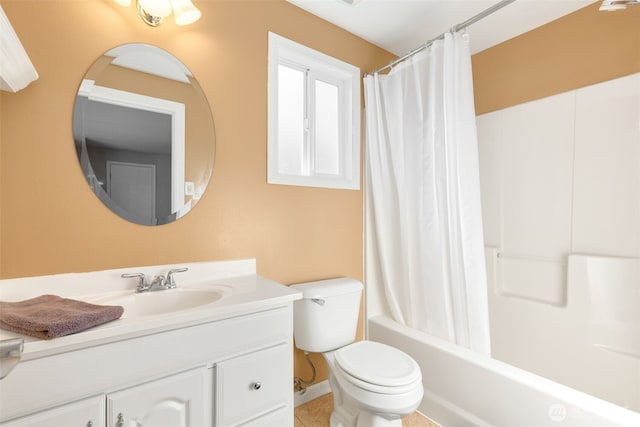 full bathroom featuring vanity, tile patterned flooring, toilet, and shower / bath combo with shower curtain