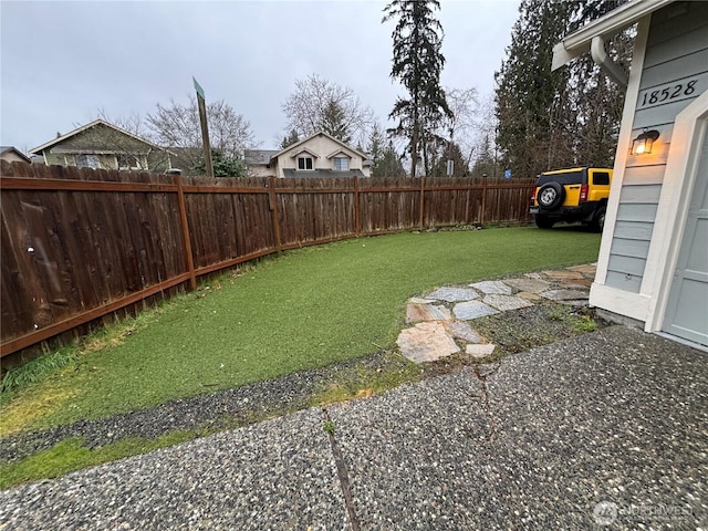 view of yard featuring a fenced backyard