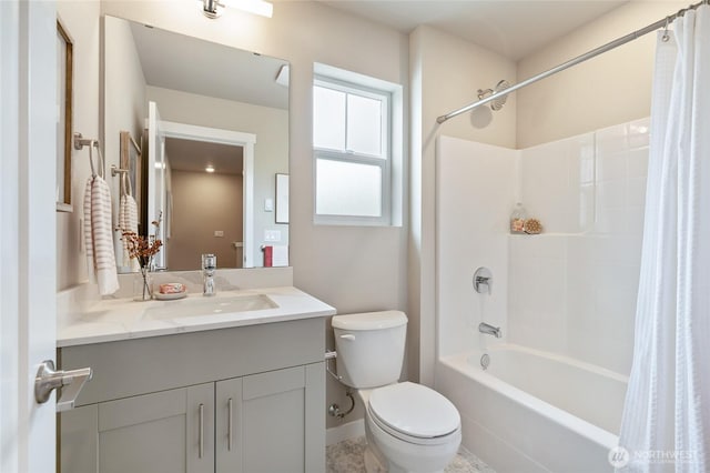 full bathroom with vanity, toilet, and shower / tub combo with curtain