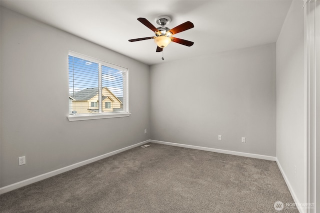 unfurnished room with carpet and ceiling fan