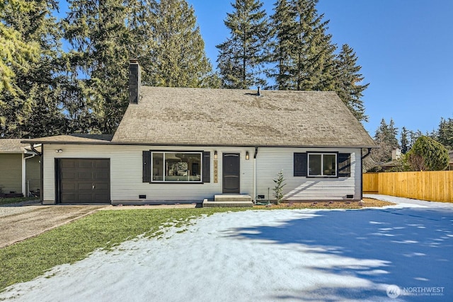 view of front of home with a garage