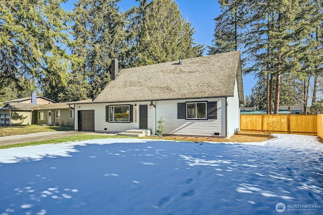 view of front of home featuring a garage