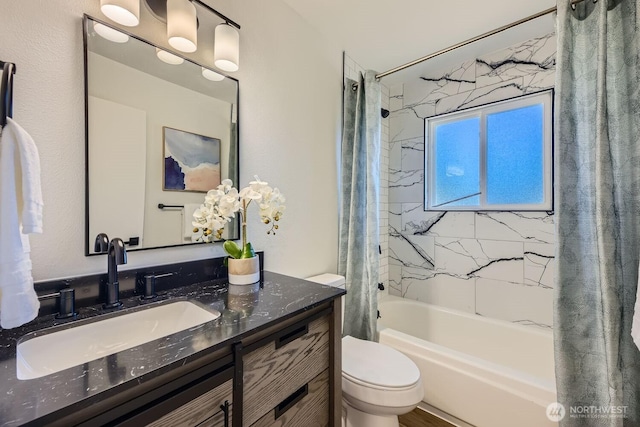 full bathroom featuring vanity, toilet, and shower / tub combo with curtain