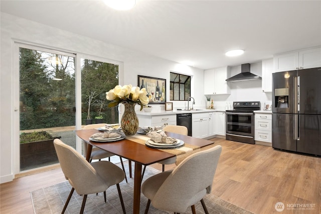 dining room featuring light wood-type flooring