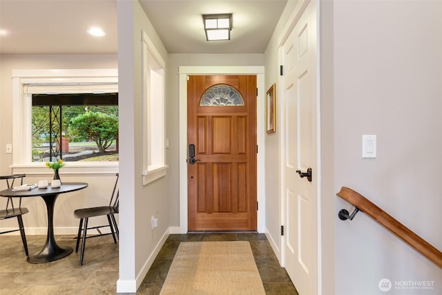 entrance foyer featuring baseboards