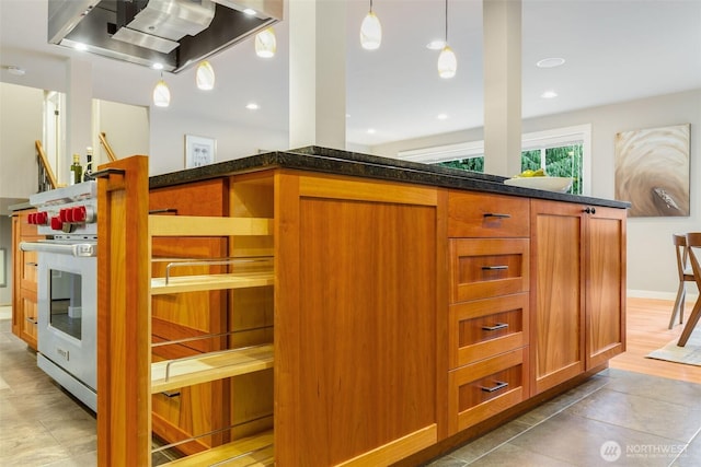 bar with pendant lighting, wall chimney exhaust hood, recessed lighting, light tile patterned flooring, and baseboards