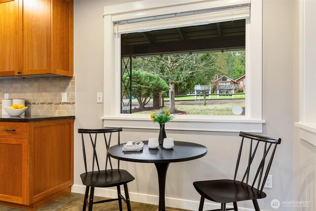 dining space with a healthy amount of sunlight