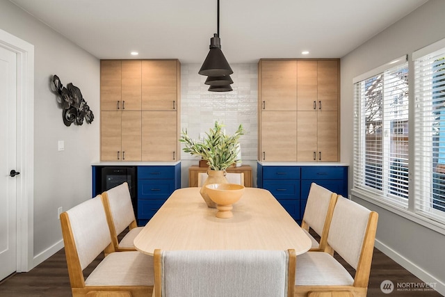 dining space featuring dark hardwood / wood-style floors