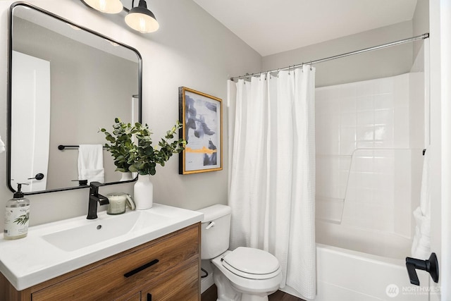 full bathroom with vanity, toilet, and shower / bath combo with shower curtain