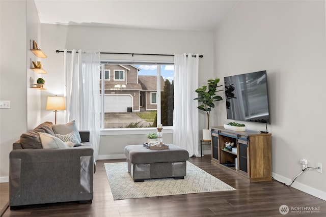 living room featuring baseboards and dark wood-style flooring