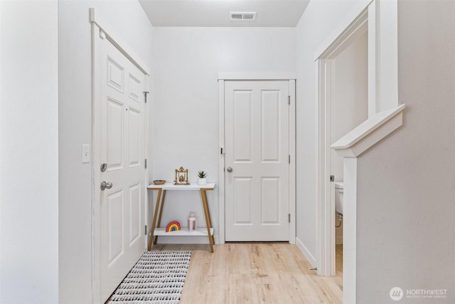 mudroom featuring light hardwood / wood-style flooring