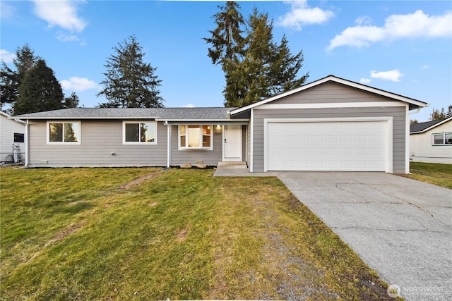 ranch-style home with a garage and a front yard