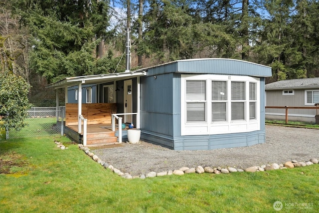 view of outdoor structure with a lawn