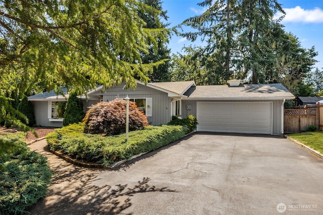 ranch-style home with a garage