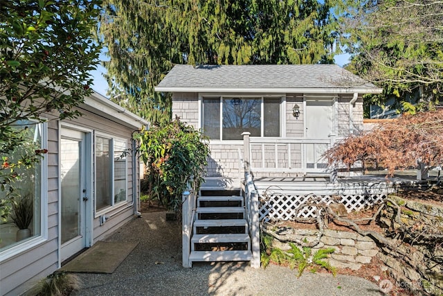 view of front of home with a deck