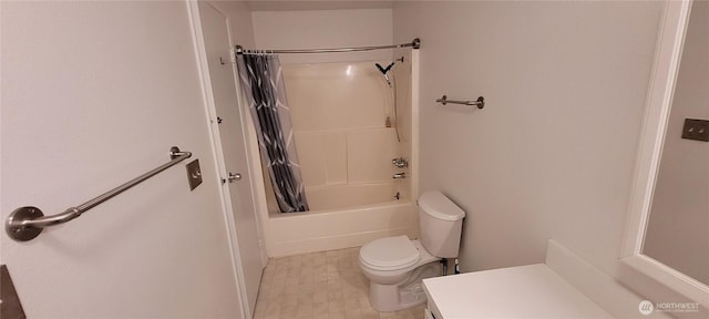 bathroom with toilet, shower / bathtub combination with curtain, and vanity