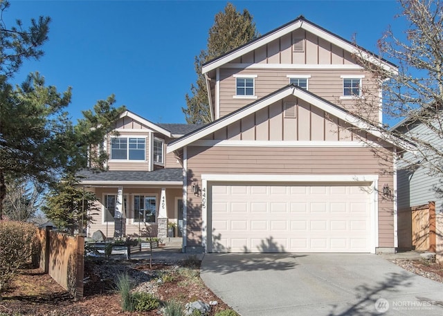 craftsman-style house featuring a garage and covered porch