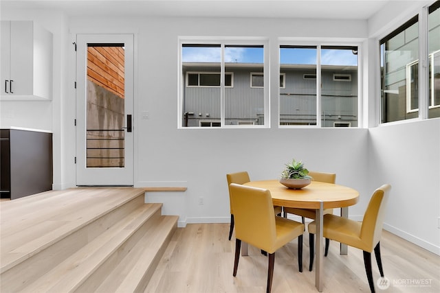 dining room featuring light hardwood / wood-style floors