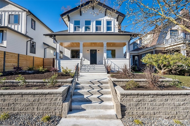 view of front of home featuring covered porch