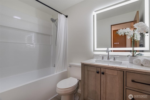 full bathroom featuring shower / bathtub combination with curtain, vanity, and toilet