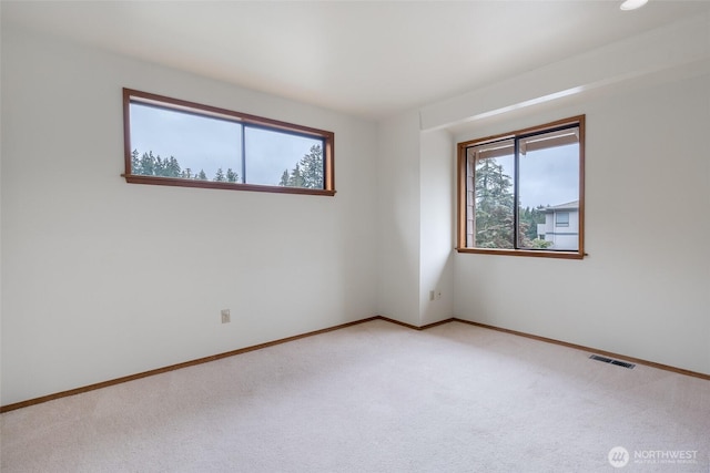 view of carpeted spare room