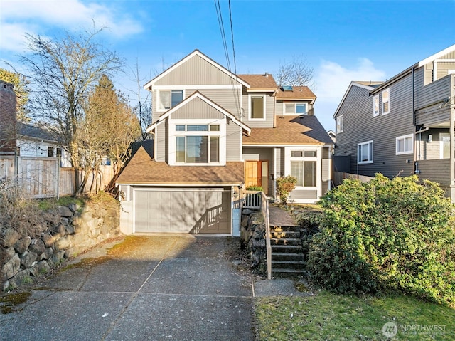 view of front of property with a garage