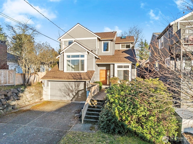 view of front of property with a garage