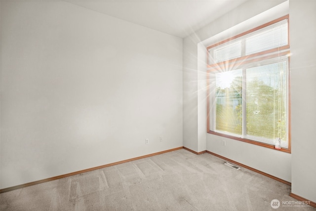 view of carpeted spare room