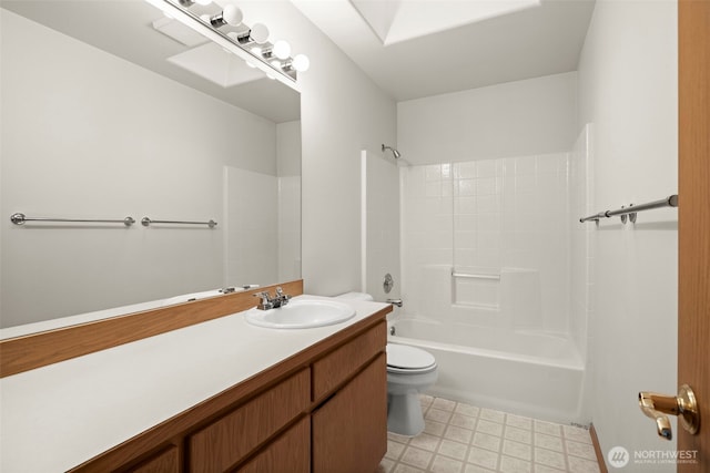 full bathroom featuring vanity, tub / shower combination, and toilet