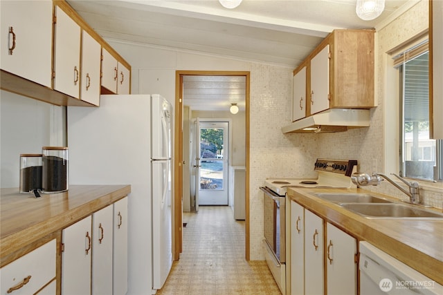 kitchen with lofted ceiling with beams, sink, white cabinets, and white appliances