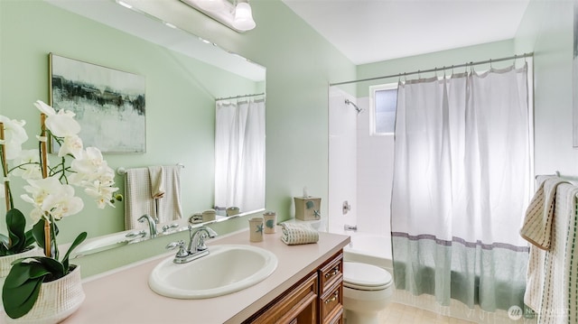 full bathroom with vanity, toilet, and shower / bath combo