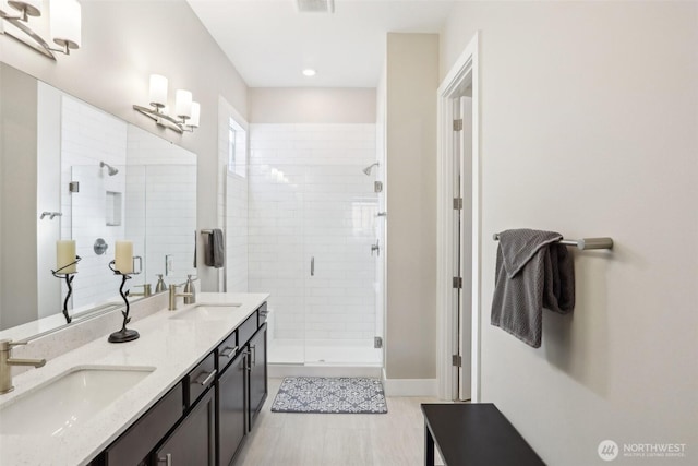 bathroom featuring vanity and walk in shower