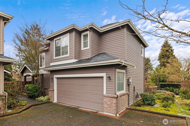 view of front of home with a garage