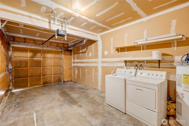 garage with water heater, separate washer and dryer, and a garage door opener