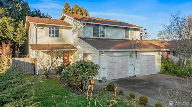 view of front of home with a garage