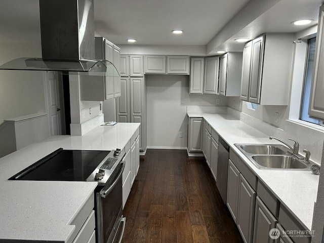 21405 124th Ave SE, Kent, WA 98031 - kitchen with dark wood-type flooring, gray cabinets, a sink, appliances with stainless steel finishes, and wall chimney range hood