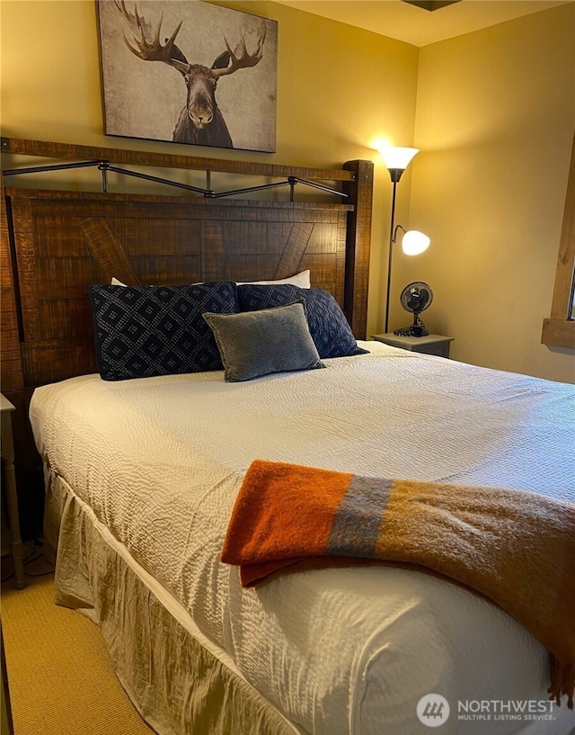 bedroom featuring carpet flooring