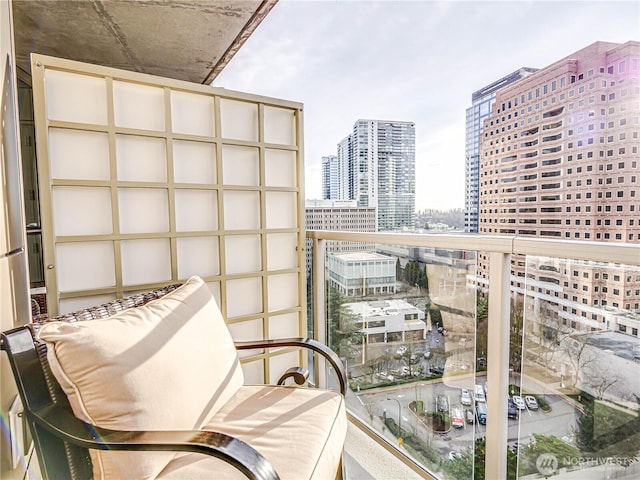 balcony featuring a view of city