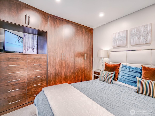 bedroom with recessed lighting and carpet flooring