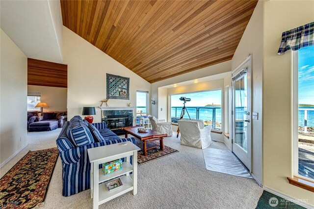 living area with high vaulted ceiling, a fireplace, carpet flooring, wood ceiling, and baseboards