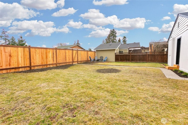 view of yard featuring a fenced backyard