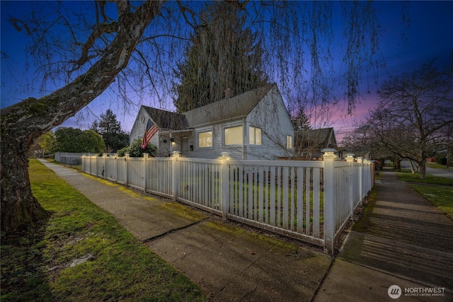 view of property exterior at dusk