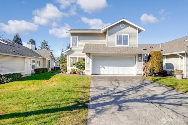 view of front of home with a garage and a front yard