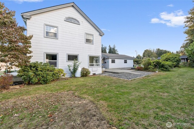 4412 Dyes Inlet Rd NW, Bremerton, WA 98312 - back of house with a lawn and a patio area